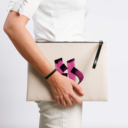 Personalized Arabic Pouch for Storing Makeup and Essentials in pink holding on hand
