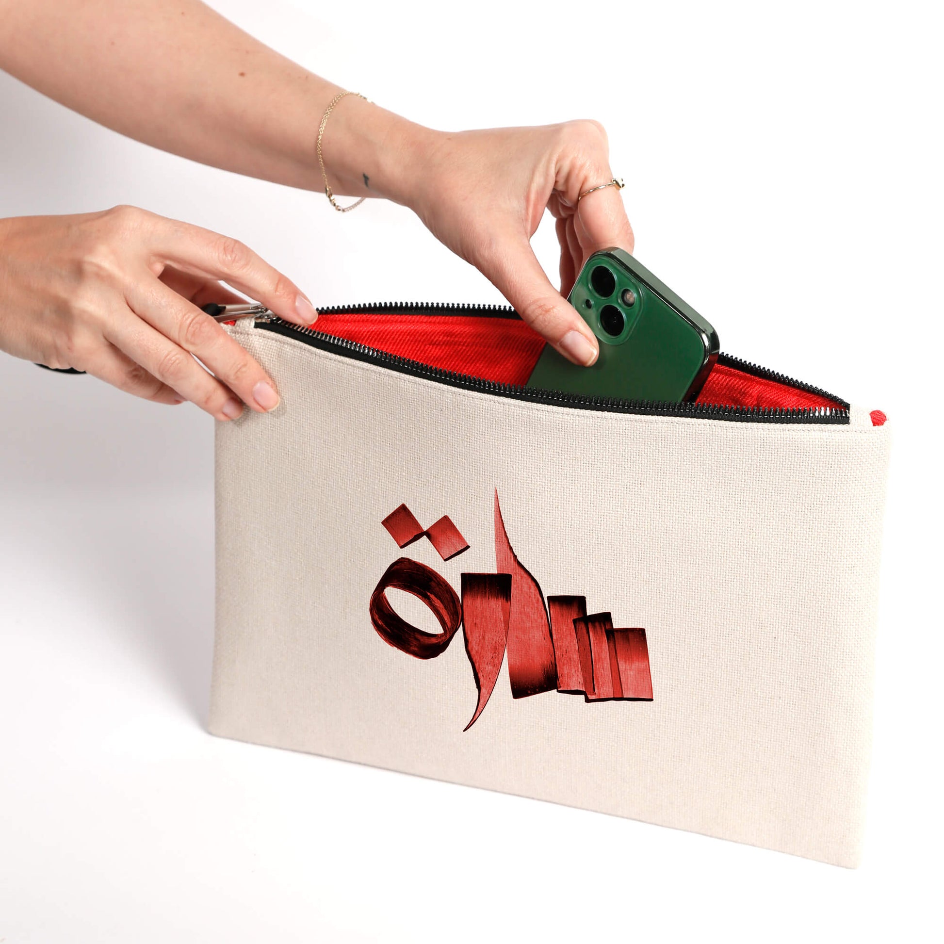 Personalized Arabic Pouch for Storing Makeup and Essentials holding phone