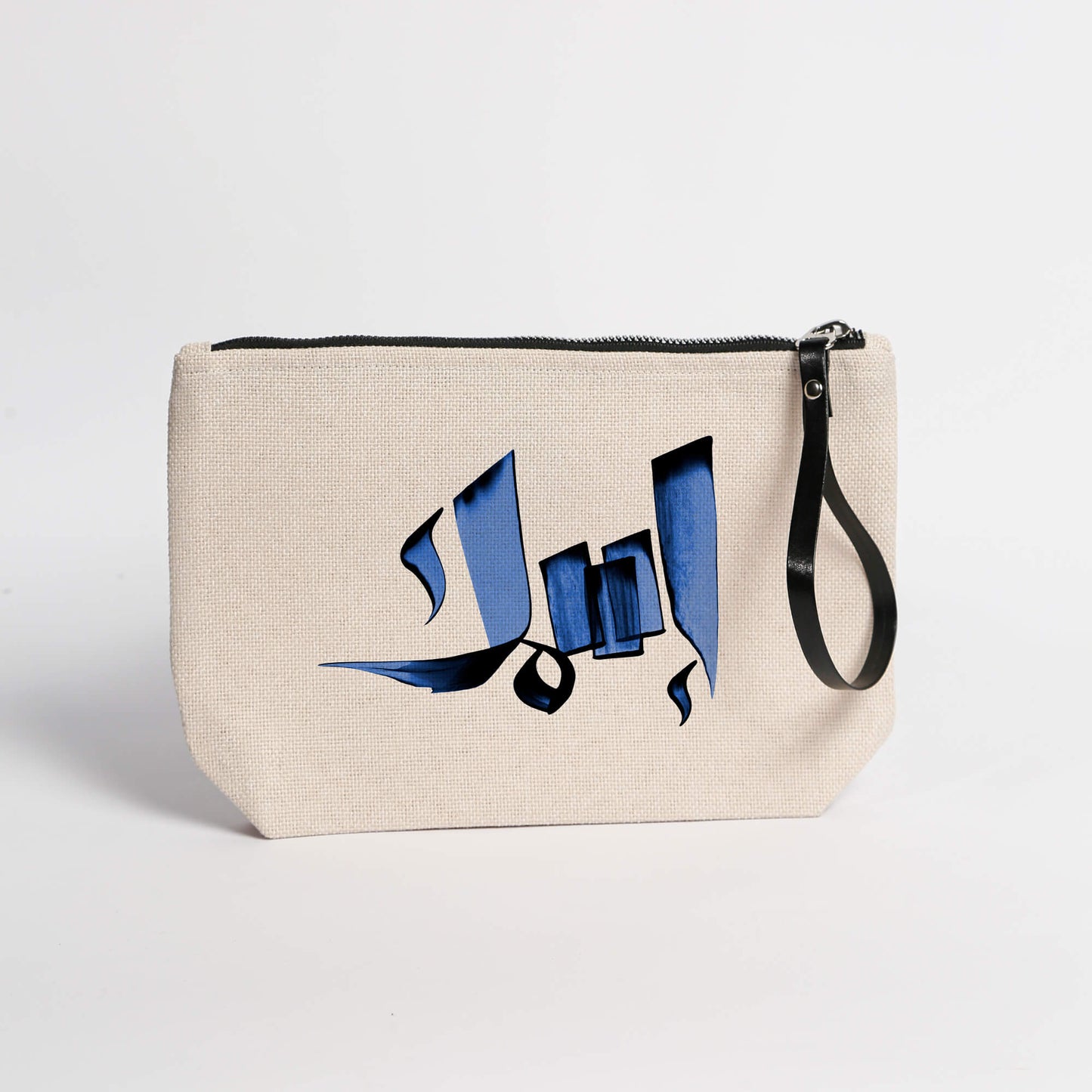 Personalized beige carryall pouch with a blue Arabic calligraphy print in isim style